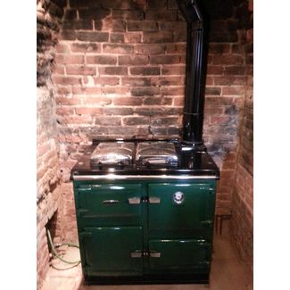 We installed this green enamel oil Rayburn range cooker and lined the chimney in Lowestoft, Suffolk