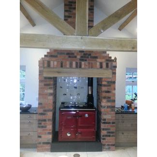 Red enamel Oil fired Rayburn Range Cooker installed by us and the chimney lined in Lound near Lowestoft, Suffolk.