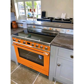 Smeg portofino complimented by Madeleine Designs hand painted glass splashback