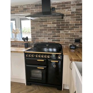 Rangemaster Classic Deluxe 90 Induction Range Cooker in Black With Brass Trim